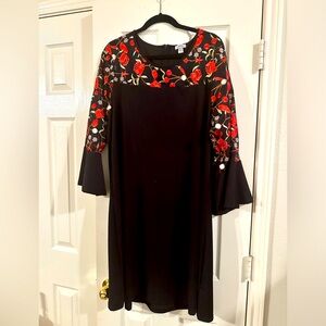 Black dress with red embroidered flowers